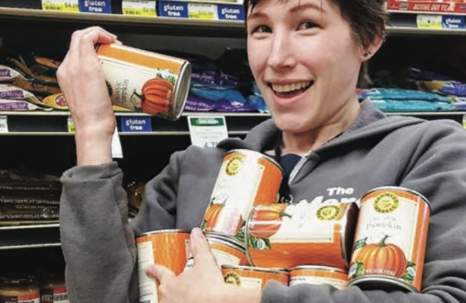 Grocery stocker with canned pumpkin