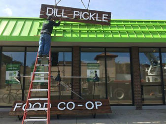 dill pickle storefront sign